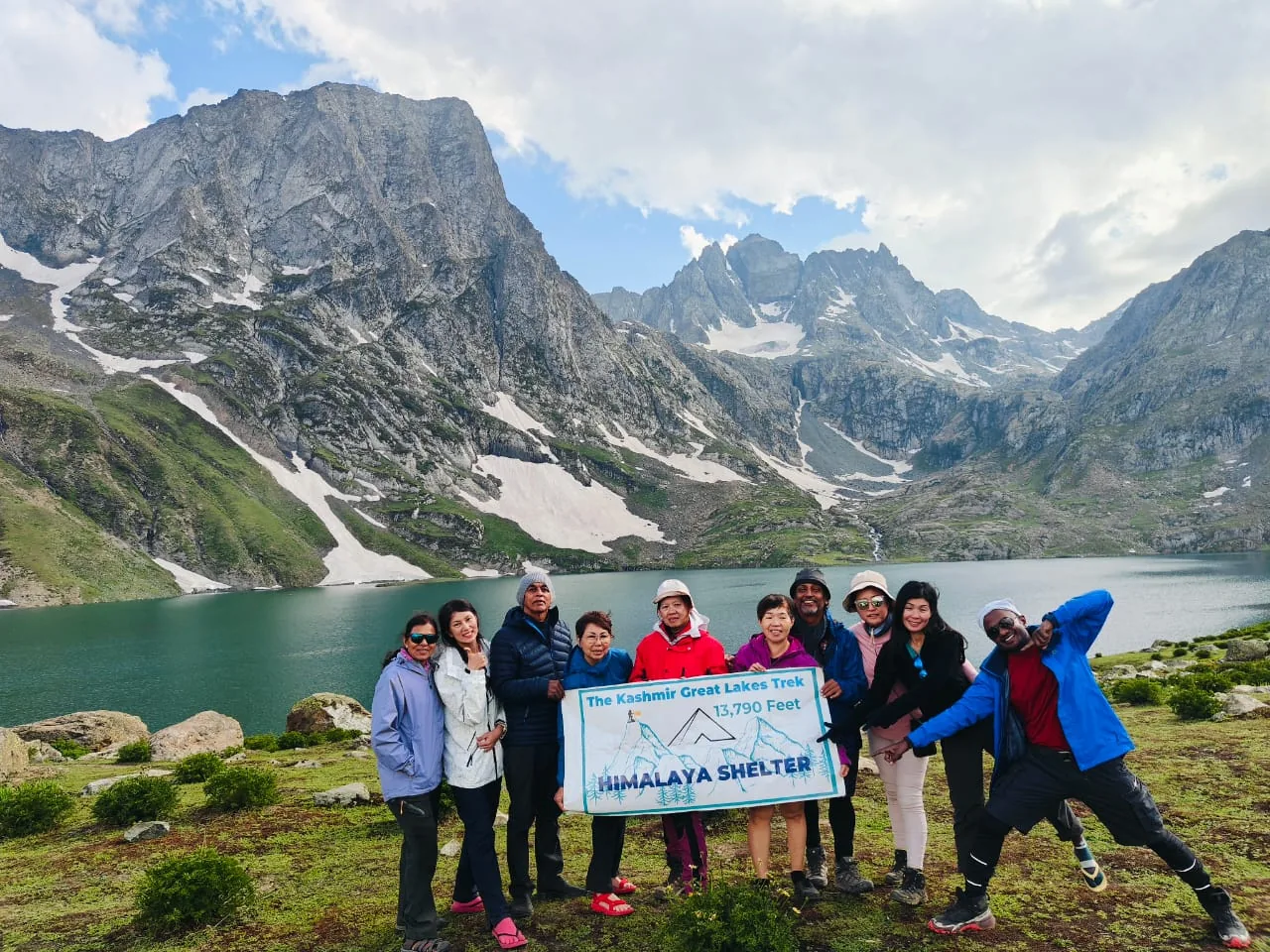 “Kashmir Great Lakes Trek hikers walking through alpine valley and lake”