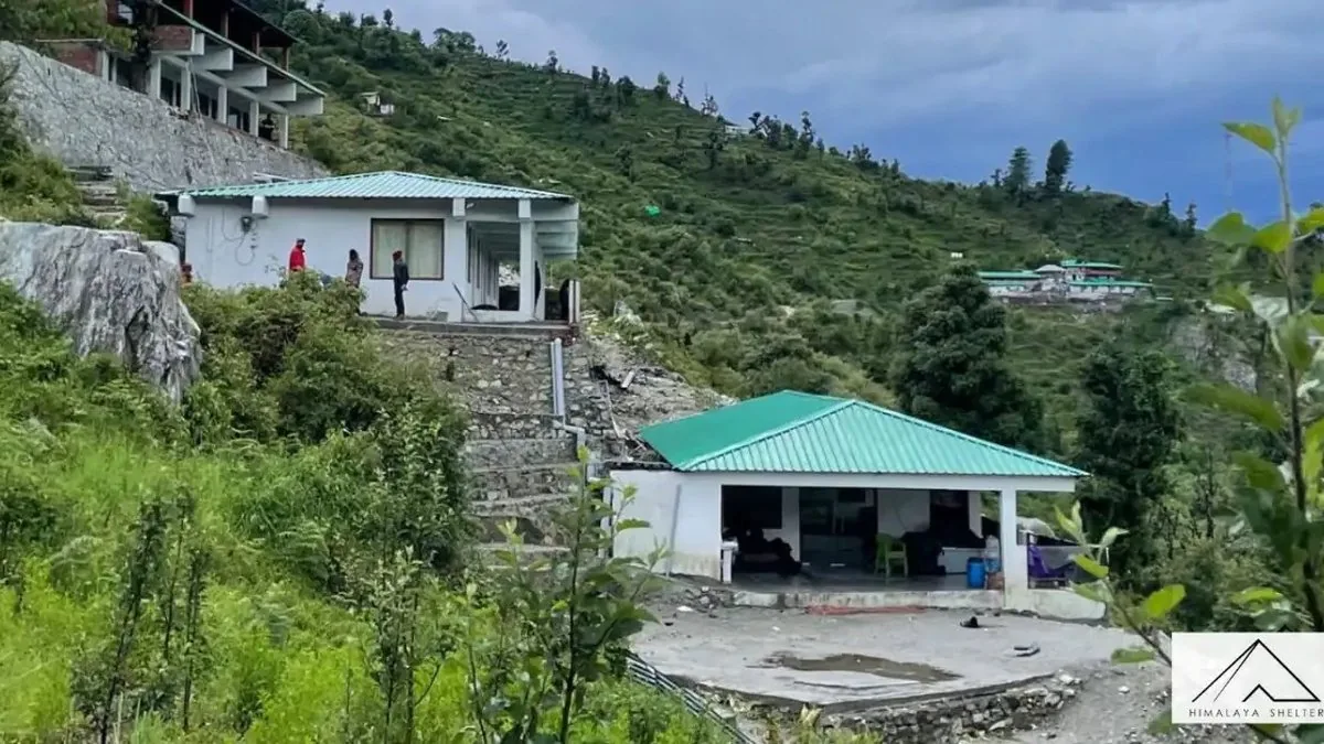 Himalaya Shelter Guest House in Sankri village with green roofs and stone steps, where Kedarkantha trekkers stay before the trek